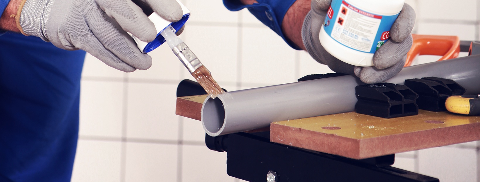 Solvent Cement applied to CPVC Pipe during installation 